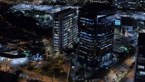 Aerial-view-of-the-buildings-illuminated,-at-night,-Sao-Paulo,-Brazil