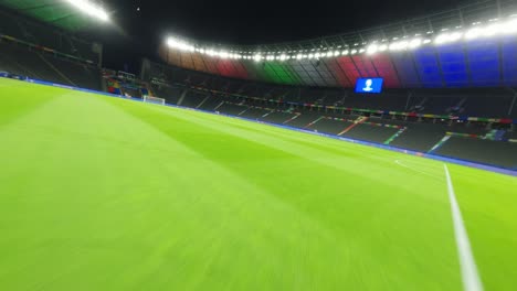 Fpv-Drone-Estadio-Olímpico-Fútbol-De-Berlín-Volando-Sobre-El-Campo-Uefa-Euro2024-Por-La-Noche-Con-Espectáculo-De-Luces