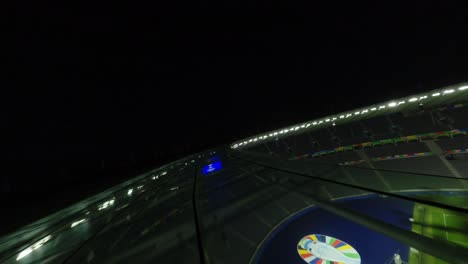 Drone-Fpv-Volando-De-Cerca-Sobre-El-Techo-Del-Estadio-Olímpico-De-Berlín-Uefa-Euro2024-Por-La-Noche