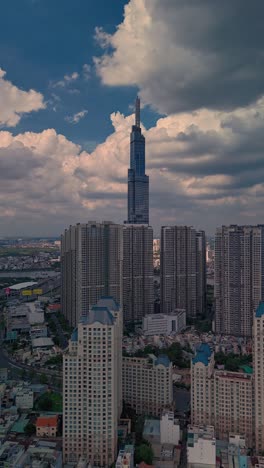 Vertical-Hyperlapse-video-of-landmark-building-and-central-park,-Ho-Chi-Minh-City,-Vietnam