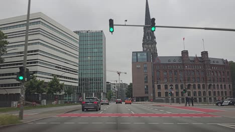 POV-wide-angle-footage-of-driving-in-the-city-centre