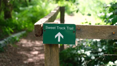 Close-up-of-Sweet-Track-Trail-sign-in-nature-reserve-on-the-Somerset-Levels-in-England-UK