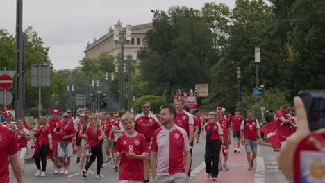 Front-view-of-danish-fans-walking-before-match-being-over-in-Frankfurt,-Germany