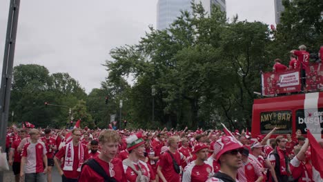 Confident-Danish-fans-heading-to-stadium-for-supporting-Denmark-at-EURO-Cup-2024-matches-in-Frankfurt,-Germany