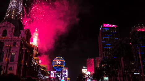 New-Year-Fireworks-Above-Las-Vegas-Strip-USA,-Hotel-Casinos-and-People-on-Celebration