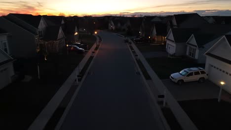 Drone-flyover-american-neighborhood-during-golden-sunset