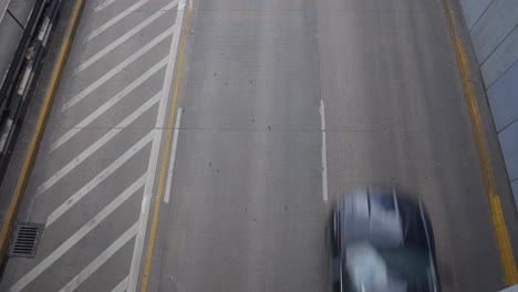 Cars-driving-on-motorway-freeway-road,-traffic-in-Mexico-City,-drop-down-view