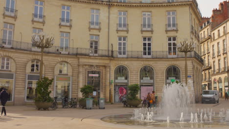 View-of-Graslin-Square-with-a-fountain-in-Nantes,-France-during-daytime