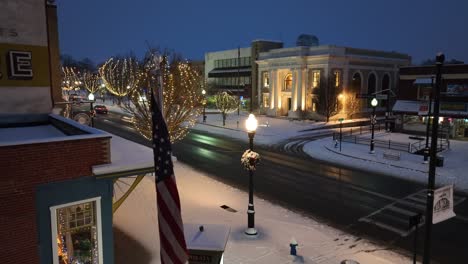 American-flag-in-snow-covered-USA-town-during-Christmas-morning