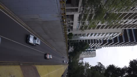 Mexico-City-motorway-freeway-road,-cars-joining-traffic,-vertical-video