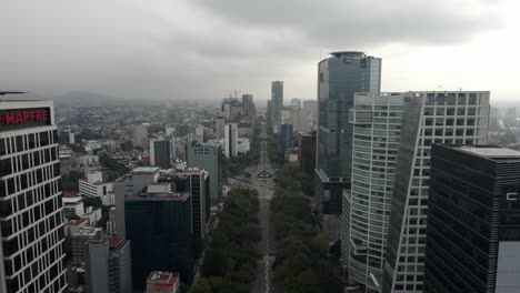 Mexico-City-CDMX-Avenida-Paseo-de-la-Reforma,-aerial-drone-establish-shot