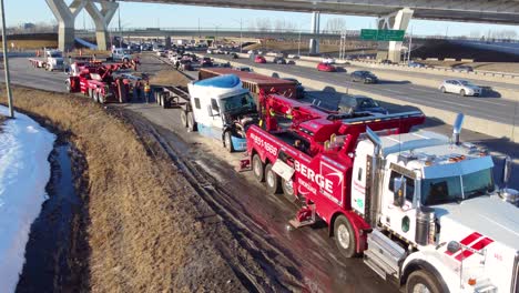 Truck-with-Fallen-Cargo-Container-Recovery-operation-near-Highway,-Aerial