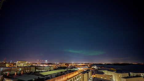 Time-lapse-of-Northern-lights,-Aurora-borealis-night-sky-in-Helsinki,-Finland