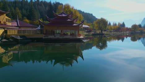 Aerial-Beautiful-view-of-Shangrila-Resort-buildings-reflecting-on-the-calm-waters-of-Lower-Kachura-Lake-in-Skardu-Valley