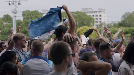 Shot-of-British-fans-cheering-and-enjoying-after-their-goal-against-Denmark-in-EURO-Cup-2024-in-Frankfurt,-Germany