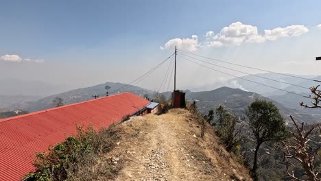 Walking-along-the-roofs-of-a-rural-house-in-Chipling