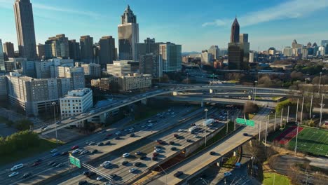 Busy-traffic-on-highway-of-american-town-During-sunset-time