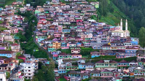 Aerial-view-of-colorful-terraced-settlement-on-hillside-in-beautiful-morning