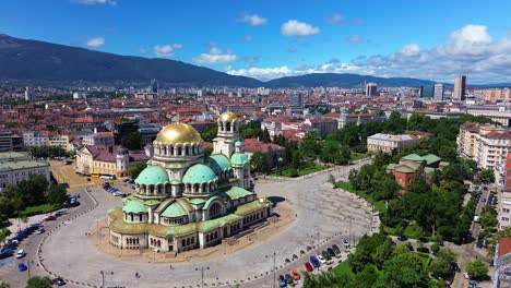 Areal-cityscape-of-Sofia,-Bulgaria-with-the-majestic-Saint-Alexander-Nevsky-Cathedral-in-the-foreground