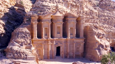 Aerial-view-of-The-Monastery-Ed-Deir-building-carved-into-mountains-in-the-ancient-city-of-Petra-in-Jordan