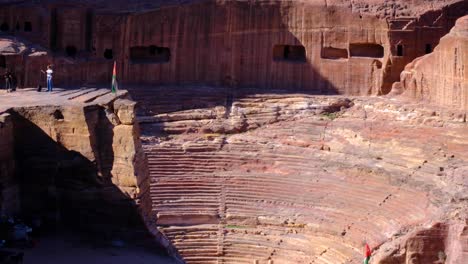 Elevated-view-overlooking-Nabataean-Petra-Theater-in-red-sandstone-rocky-mountains-within-the-ancient-city-of-Petra-in-Jordan