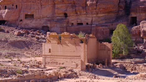 View-of-Qasr-al-Bint-religious-temple-and-red-sandstone-mountains-in-the-Nabataean-ancient-city-of-Petra,-Jordan