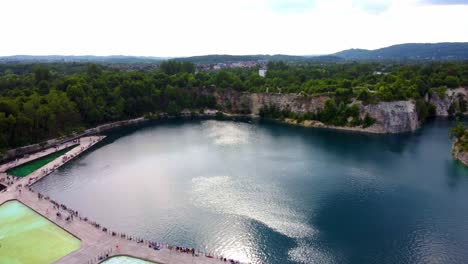 Swimming-Pool-In-Old-Quarry,-Zakrzowek,-Krakow,-Poland---Aerial-Drone-Shot