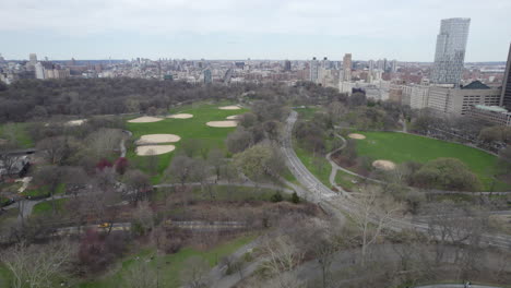 Central-Park-the-great-lawn,-golf-courts,-East-meadow-in-New-York-City,-aerial-overview