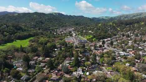 Distant-and-high-elevation-drone-shot-of-Fairfax,-California-on-a-sunny-day