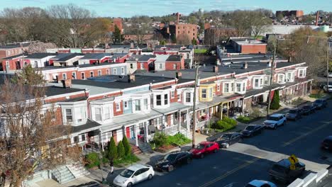 Walking-Pedestrian-on-sidewalk-in-american-neighborhood-with-townhouses-and-porch