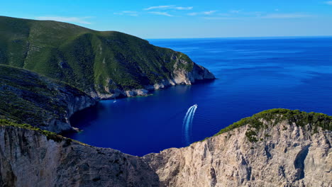 Beautiful-mountain-and-ocean-panorama-in-Navagio,-Greece,-aerial-orbit