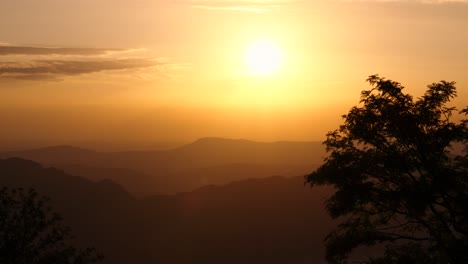 Sun-at-sunset-view-from-belvedere-Mountain-Revard,-France,-hills-highlights