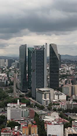 Aerial-perspective-of-skyscrapers-along-Paseo-de-la-Reforma-in-vertical-mode
