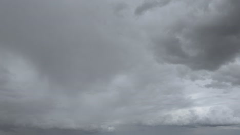 Dark-storm-clouds-move-rapidly-across-the-sky-in-a-dramatic-timelapse