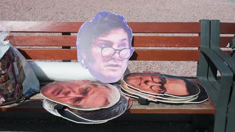 A-cut-out-face-of-far-right-politician,-Argentine-president-Javier-Milei,-is-seen-on-a-bench-during-the-demonstration-against-the-extreme-right-and-fascist-movements-in-Europe