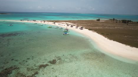 A-beautiful-beach-with-clear-turquoise-water-and-white-sand-in-los-roques,-aerial-view