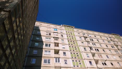 Dolly-to-the-right-of-a-residential-layered-concrete-prefab-flat-building-in-the-Baltics