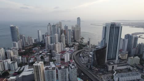 Panama-City,-Punta-Pacifica-aerial-view-showcasing-modern-high-rises-and-coastline