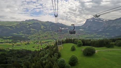 Cable-Car-gondola-ride-towards-Switzerland-Jungfrau-summit-mountain-vacation-travel