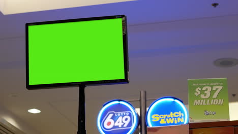 The-motion-of-a-green-TV-screen-inside-a-mall-lottery-ticket-retailer-tooth
