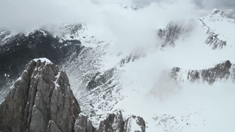 Aerial-View-of-Nordkette-Peaks-of-Austrian-Alps-Above-Innsbruck-Ski-Resort-in-Winter-Season,-Drone-Shot