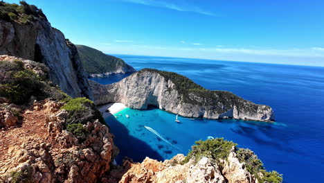 Navagio-Beach-Viewpoint-in-Elatia,-Greece-with-stunning-blue-waters-and-rugged-cliffs