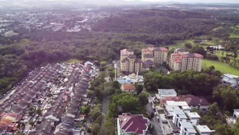 Drone-flies-over-buildings-while-panning-up