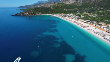 Seaside-Getaway-in-the-Ionian-Coast-with-Blue-Waters,-White-Sandy-Beach,-and-a-Beautiful-Summer-for-Holiday