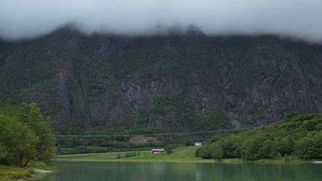 Timelapse-of-overcast-weather-over-a-river-in-Åndalsnes,-Western-Norway