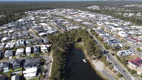 Aerial-view-of-a-dense-Australian-residential-suburb-showing-part-of-a-manmade-lake
