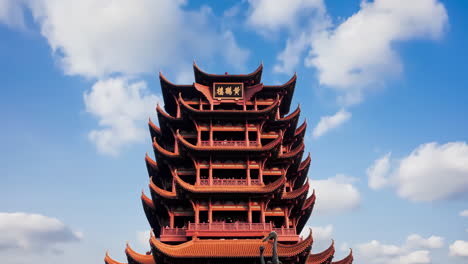 Timelapse-of-blue-sky-cloud-moving-over-ancient-old-cityscape-yellow-crane-temple-tower-scenery-aerial-panorama