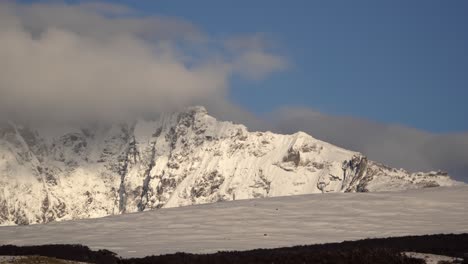Timelapse-of-Cerro-Huemul-summit-covered-by-low-clouds-in-snowy-Patagonia,-Argentina-near-El-Chalten