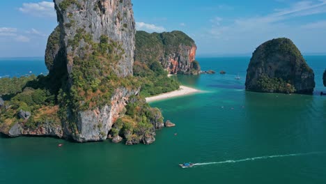 Scenic-View-Of-Rocky-Cliffs-At-Railay-Beach-Peninsula,-Thailand---Aerial-Drone-Shot