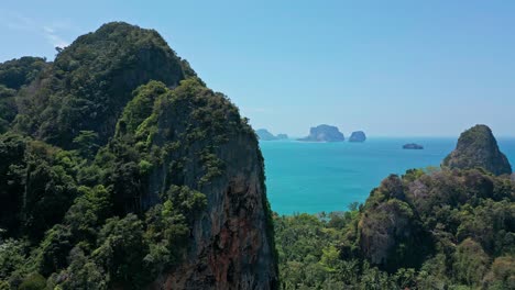 Limestone-Cliffs-At-Railay-Beach-In-Thailand---Aerial-Drone-Shot